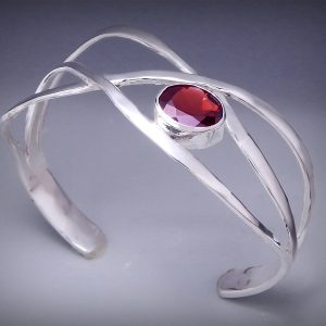 Woven Bracelet with a Single Gem